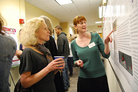 Post-doc Maria Schug explains her research to Ruth Striegel-Moore, Professor and Chair of Psychology