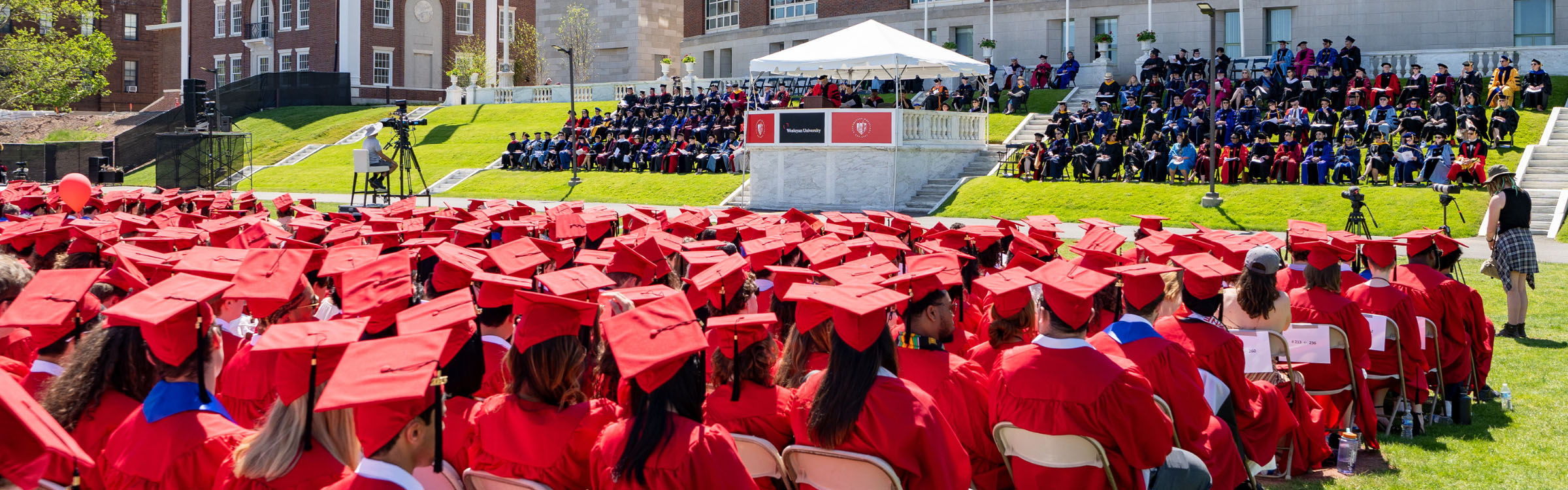 Graduating class, families, and guests at Commencement