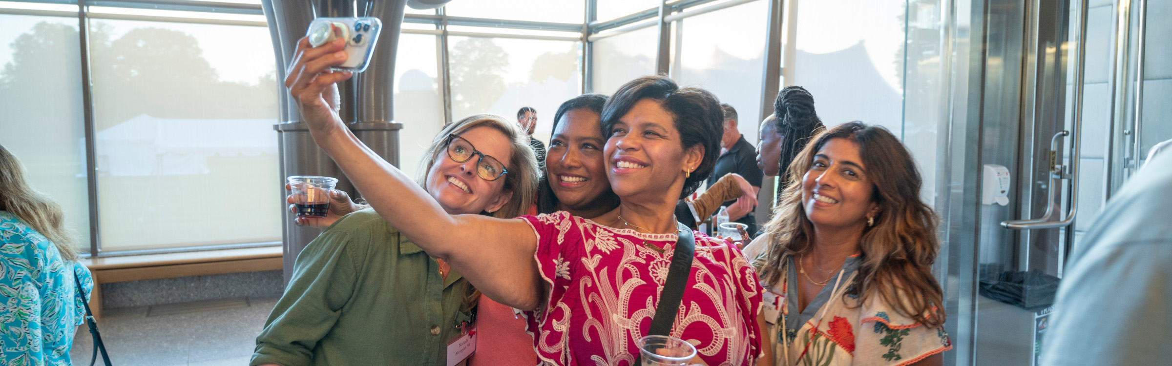 A group of Wesleyan Alumni taking a selfie